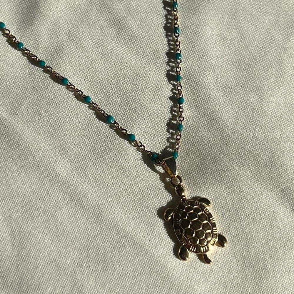 Gold Turtle Pendant on Turquoise Beaded Necklace